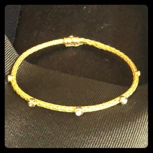 Gold (18k) braided bangle w/ 5 bezel set diamonds